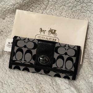Brand new Coach wallet with tags.